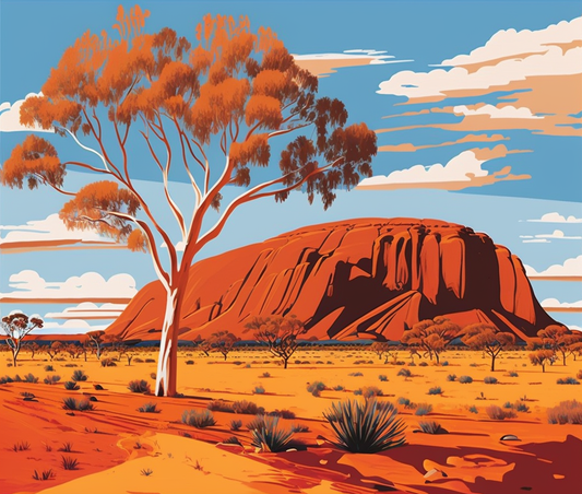 Desert landscape with a large tree and rock formation under a blue sky.
