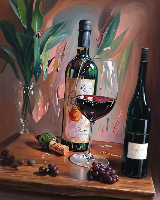 Wine bottle, glass, and grapes on a wooden surface with abstract background